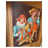 This vintage mid-century modern 3D wall sculpture, titled "Jesters and Clowns" or "Renaissance Minstrels," is a fiberglass art piece by the artist J. Segura