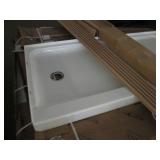 Pallet of shower bases, walls and m...