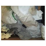 Pallet of assorted clothes and bedd...