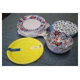 Plastic dinner plates and salad bow...