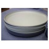 Plastic oval plates, mugs, and serv...
