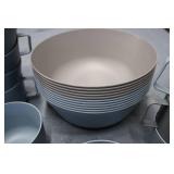 Plastic oval plates, mugs, and serv...