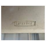 Lifetime Folding Table with Yard Tools - Garage Storage
