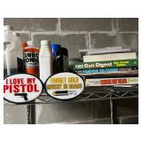Vertical Metal Storage Rack w Contents Included! Gun Digest Books & Pistol Signs & More! Contents quantities unverified - 75" x 24"