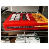Vertical Metal Storage Rack w Contents Included! Gun Digest Books & Pistol Signs & More! Contents quantities unverified - 75" x 24"