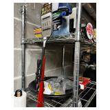 Vertical Metal Storage Rack w Contents Included! Gun Digest Books & Pistol Signs & More! Contents quantities unverified - 75" x 24"