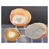 Hand-Carved Agate Geode Candle Holder – Vibrant Red & Blue Banding. Polished Agate Trinket Dish – Warm Amber & Cream "Fortification" Agate. Large Brazilian Agate Display Slab – Fiery Ora
