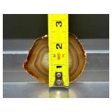 Hand-Carved Agate Geode Candle Holder – Vibrant Red & Blue Banding. Polished Agate Trinket Dish – Warm Amber & Cream "Fortification" Agate. Large Brazilian Agate Display Slab – Fiery Ora