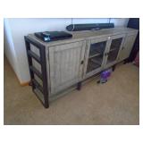 Rustic style entertainment center. As shown. CASH ON SITE ONLY. PICKUP IS MONDAY MAY 11TH FROM 11 AM TO 4 PM. REGARDLESS WHAT THE SCHEDULE STATES.