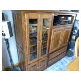 Oak entertainment center. No accessories included. As shown. CASH ON SITE ONLY. PICKUP IS MONDAY MAY 11TH FROM 11 AM TO 4 PM. REGARDLESS WHAT THE SCHEDULE STATES.