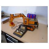 RC excavator digger. Approx 20. As shown. CASH ON SITE ONLY. PICKUP IS MONDAY MAY 11TH FROM 11 AM TO 4 PM. REGARDLESS WHAT THE SCHEDULE STATES.