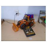 RC Payloader. Approx 20. As shown. CASH ON SITE ONLY. PICKUP IS MONDAY MAY 11TH FROM 11 AM TO 4 PM. REGARDLESS WHAT THE SCHEDULE STATES.