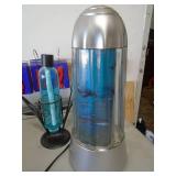 Dolphin themed lava lamp. As shown. CASH ON SITE ONLY. PICKUP IS MONDAY MAY 11TH FROM 11 AM TO 4 PM. REGARDLESS WHAT THE SCHEDULE STATES.