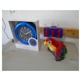 Talking parrot & led clock. As shown. CASH ON SITE ONLY. PICKUP IS MONDAY MAY 11TH FROM 11 AM TO 4 PM. REGARDLESS WHAT THE SCHEDULE STATES.