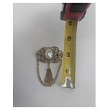 Vintage Gold-Tone Filigree Brooch with Oval Cabochon and Chain Tassels