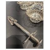 Group of small silver Baskets and olive grabber