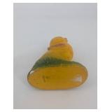 Pair of Yellow Duck Figurines on Leaf-Textured Green Bases