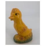 Pair of Yellow Duck Figurines on Leaf-Textured Green Bases