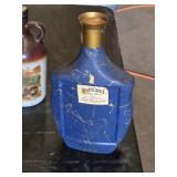 Baileys Irish Cream Tin, Beams Choice Whiskey Bottle, Jug Wine Bottle, and 1800 Tequila Bottle