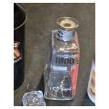 Baileys Irish Cream Tin, Beams Choice Whiskey Bottle, Jug Wine Bottle, and 1800 Tequila Bottle