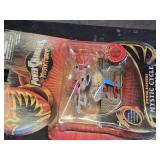 Various Collectibles and Trading Cards including Power Rangers Mystic Cycle Blasters, The Simpsons Comics, and PokÃ©mon Cards