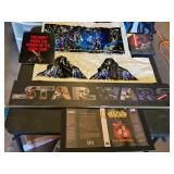 Star Wars Memorabilia Collection including Posters, Plaques, and Book Cover
