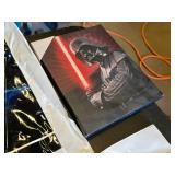 Star Wars Memorabilia Collection including Posters, Plaques, and Book Cover