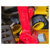 Toy Construction Vehicles Including Dump Truck, Front Loader, and Crane Truck