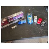 Toy vehicle collection including Big Rig and Trailer, Race Cars, and Mini Tanker Trucks