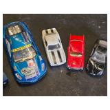 Toy vehicle collection including Big Rig and Trailer, Race Cars, and Mini Tanker Trucks