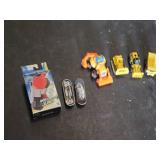 Beyblade Launcher, Tech Deck Fingerboards, and Tonka Toy Construction Vehicles