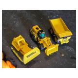 Beyblade Launcher, Tech Deck Fingerboards, and Tonka Toy Construction Vehicles