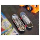 Beyblade Launcher, Tech Deck Fingerboards, and Tonka Toy Construction Vehicles