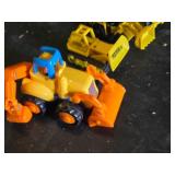 Beyblade Launcher, Tech Deck Fingerboards, and Tonka Toy Construction Vehicles