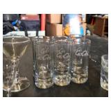 Set of Assorted Glassware Including Shot Glasses, Wine Glasses, and Novelty Glasses
