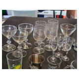Set of Assorted Glassware Including Shot Glasses, Wine Glasses, and Novelty Glasses