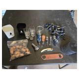 Assorted Bar Accessories including Disaronno Ice Buckets, Shot Glasses, and Wine Stoppers