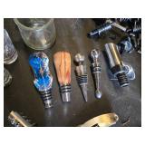 Assorted Bar Accessories including Disaronno Ice Buckets, Shot Glasses, and Wine Stoppers