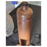Collection of Vintage Bottles Including Erven Lucas Bols Stoneware, Leather-Wrapped Bottle, and Decorative Glass Decanter