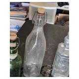 Collection of Vintage Glass Bottles and Jars