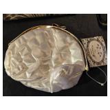 Lot of Various Handbags and Clutches including Magnolia Satin Pouch, Fashion Black Tote, and Floral Zip Pouch