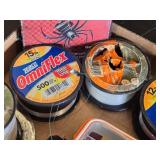 Fishing Gear Lot including Zebco OmniFlex, SpiderWire Stealth, and Ozark Trail Monofilament Lines, Reels, and Tackle Box