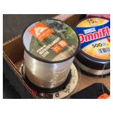 Fishing Gear Lot including Zebco OmniFlex, SpiderWire Stealth, and Ozark Trail Monofilament Lines, Reels, and Tackle Box