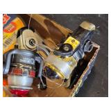 Fishing Gear Lot including Zebco OmniFlex, SpiderWire Stealth, and Ozark Trail Monofilament Lines, Reels, and Tackle Box