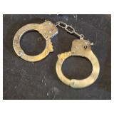 Handcuffs (no key), Knife and Slingshot Handle