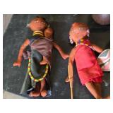 African Cultural Artifacts Collection including Wooden Dolls, Camel Figurine, and Decorative Vessels