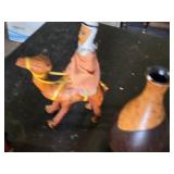 African Cultural Artifacts Collection including Wooden Dolls, Camel Figurine, and Decorative Vessels