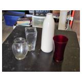 Vases and Decorative Containers Including Tall White Vase, Red Vase, and Clear Glass Vases