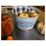 Halloween and Fall Themed Decorations including Metal Bucket, Decorative Pumpkins, and Boo Pillow