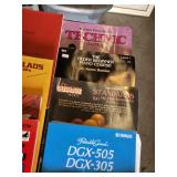 Assorted Music Books and Instructional Materials Notable titles include "Scott Joplin: King of Ragtime," "The Big Ballads of the 70s, 60s, & 50s," and "Foundations in Singing."